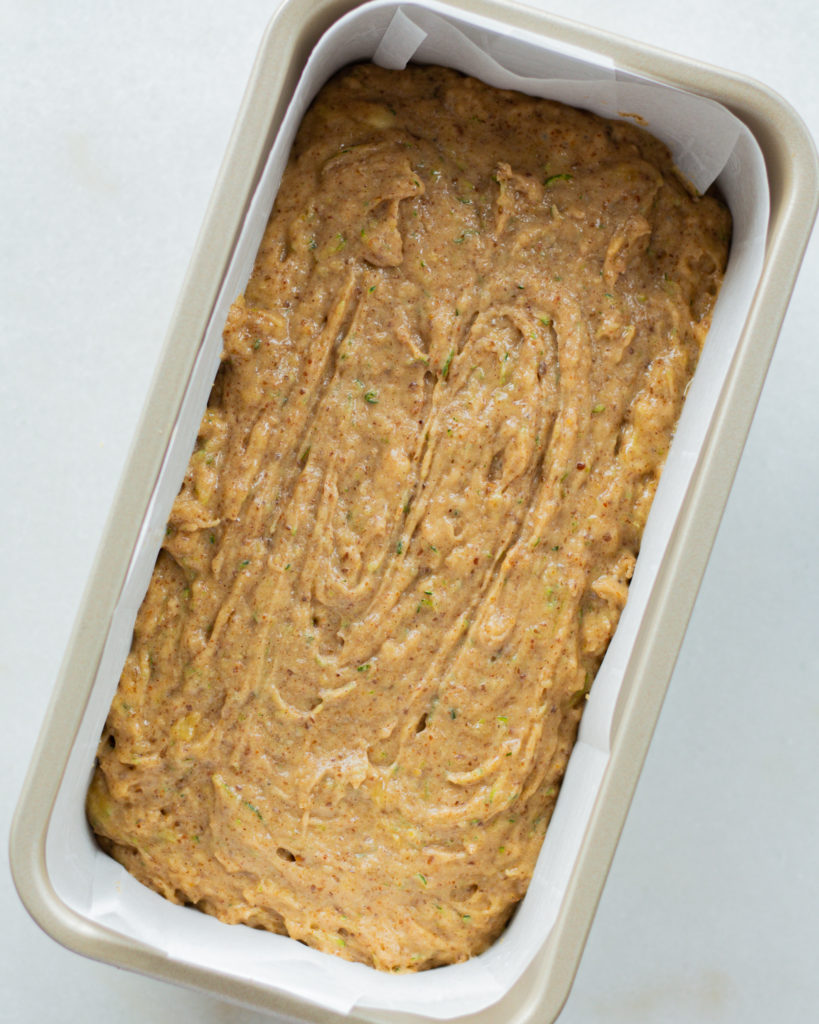 the uncooked zucchini banana bread loaf