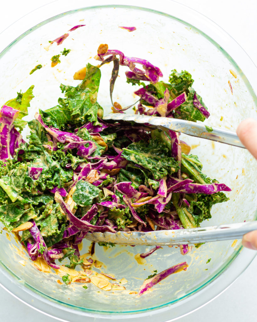 Spicy Kale & Cabbage Salad in mixing bowl