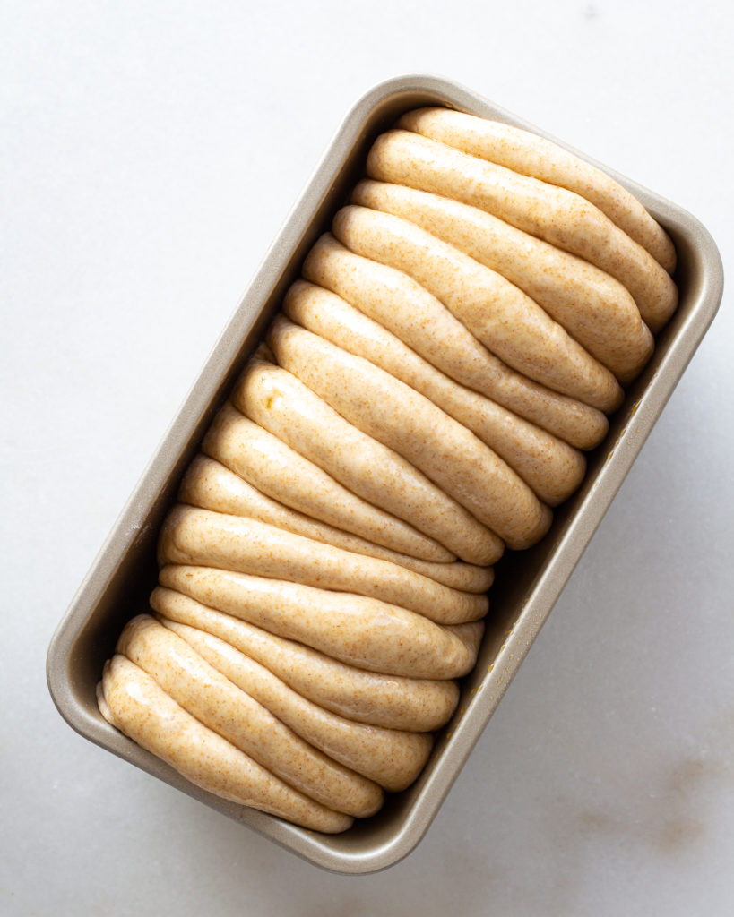 dough disks added to baking tin