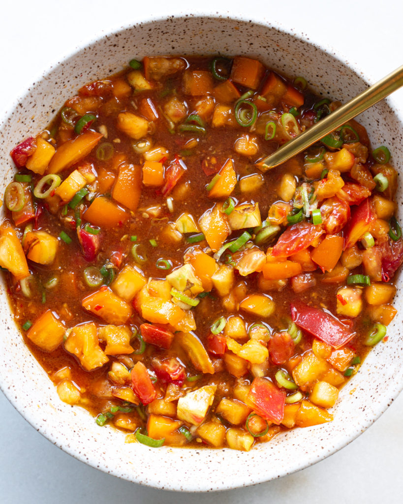 Tomatoes, scallions, and vinegar mixed
