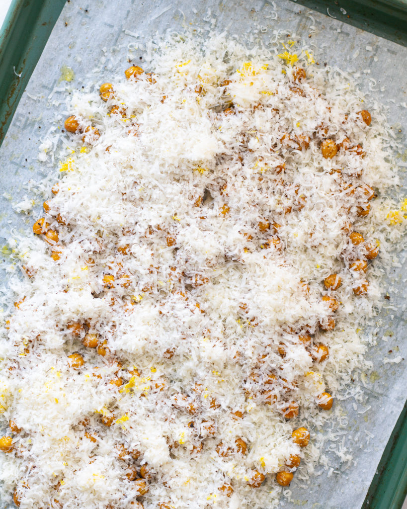 Baked chickpeas with parmesan and lemon zest on top