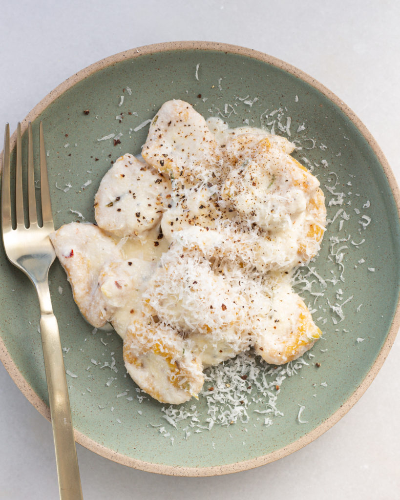 Finished Butternut Squash Dumplings with Rosemary Ricotta Sauce