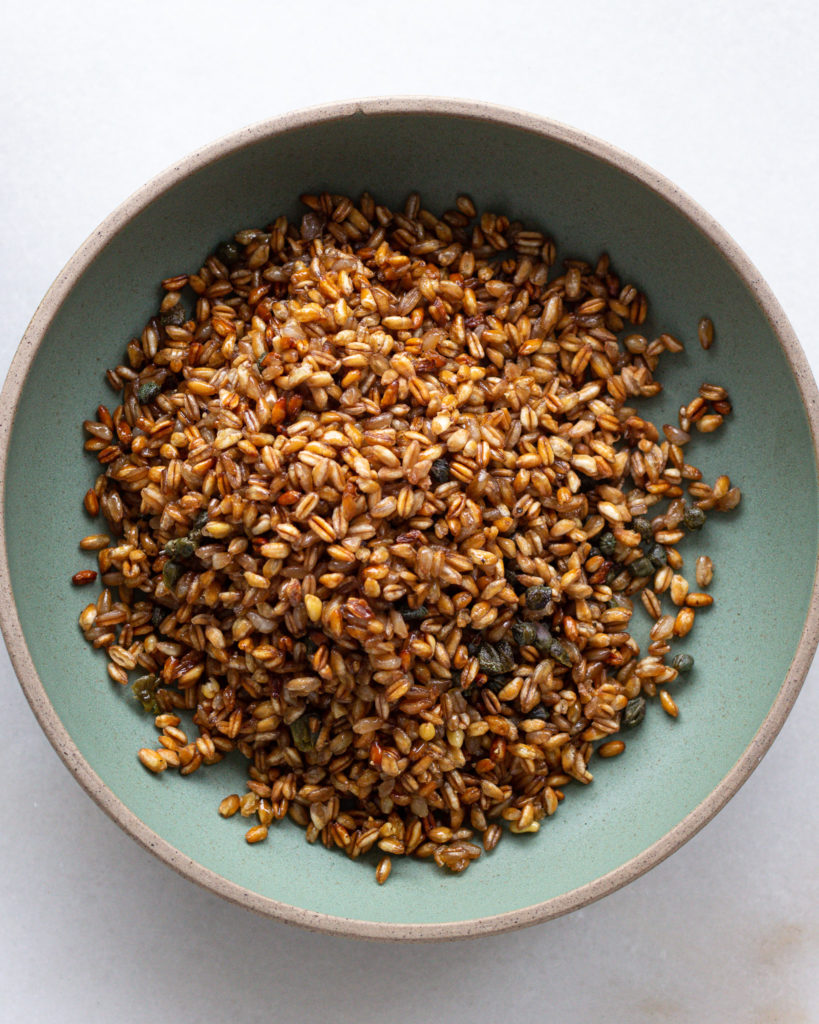 Crispy farro and capers in bowl