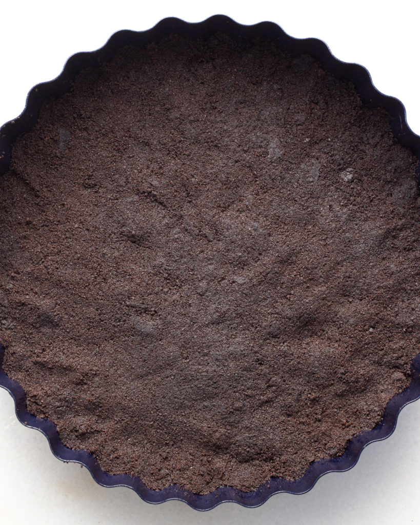 Oreo crumble pressed down in pan