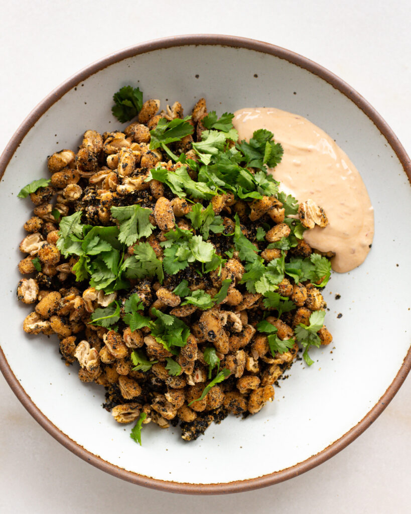 nori crusted beans and dipping sauce in a bowl