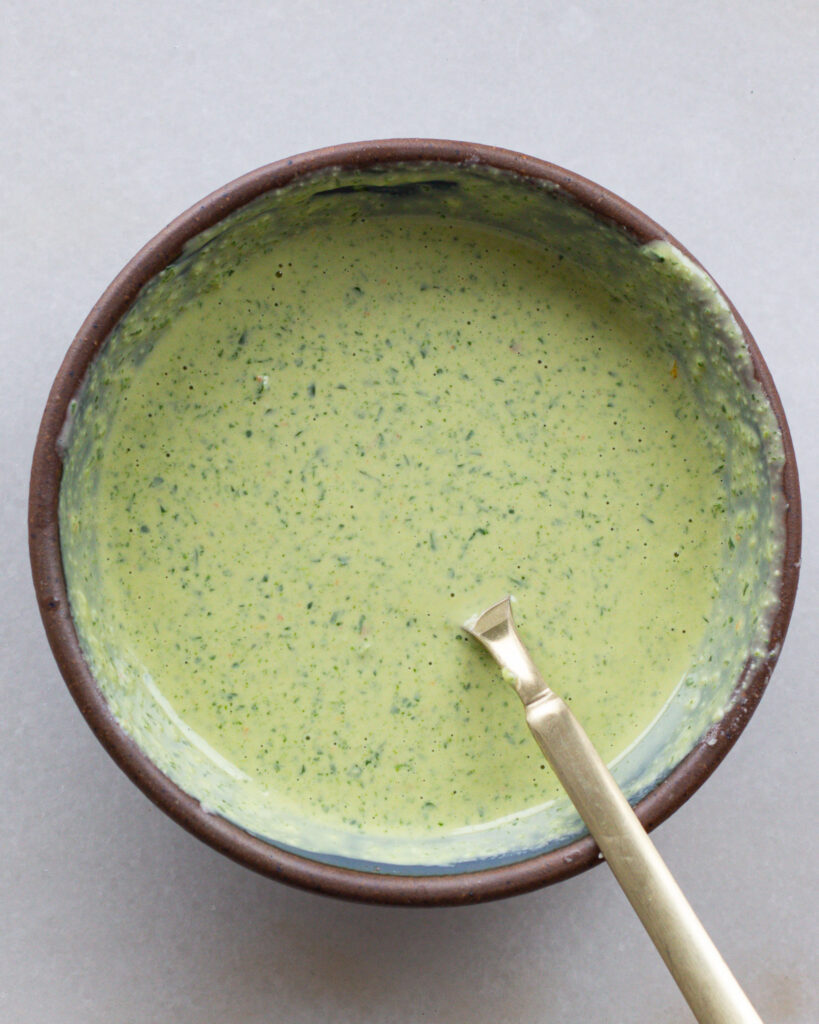 herby tahini dressing in a bowl
