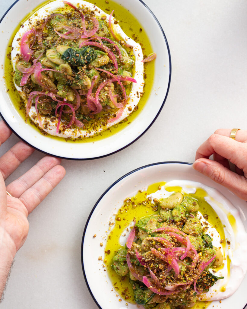 Preserved Lemon Zhoug Beans with Labneh served in two bowls