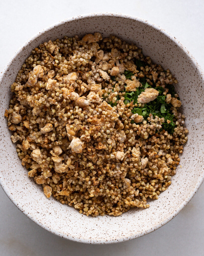 ingredients for crispy buckwheat and beans layered in a bowl