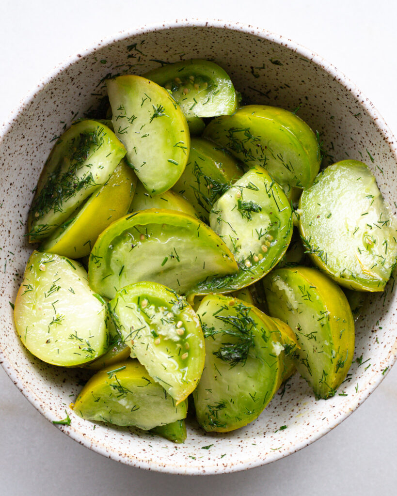 Finished green tomato salad with dill dressing