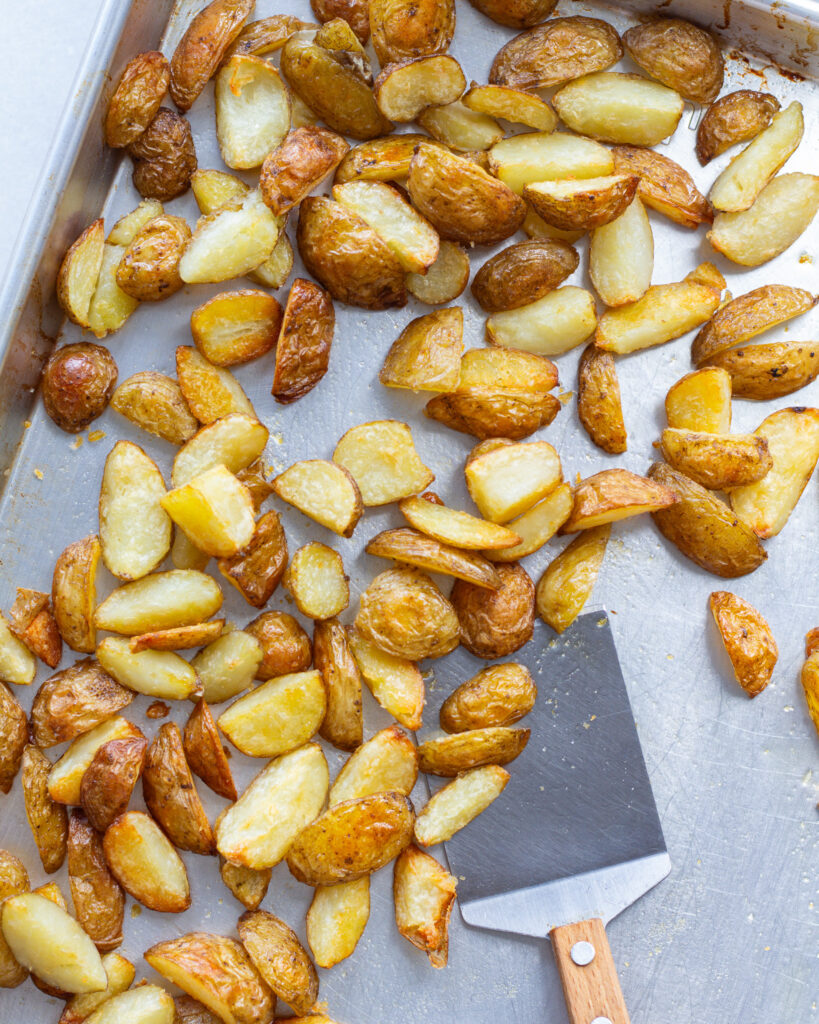 Oven roasted potatoes on baking sheet