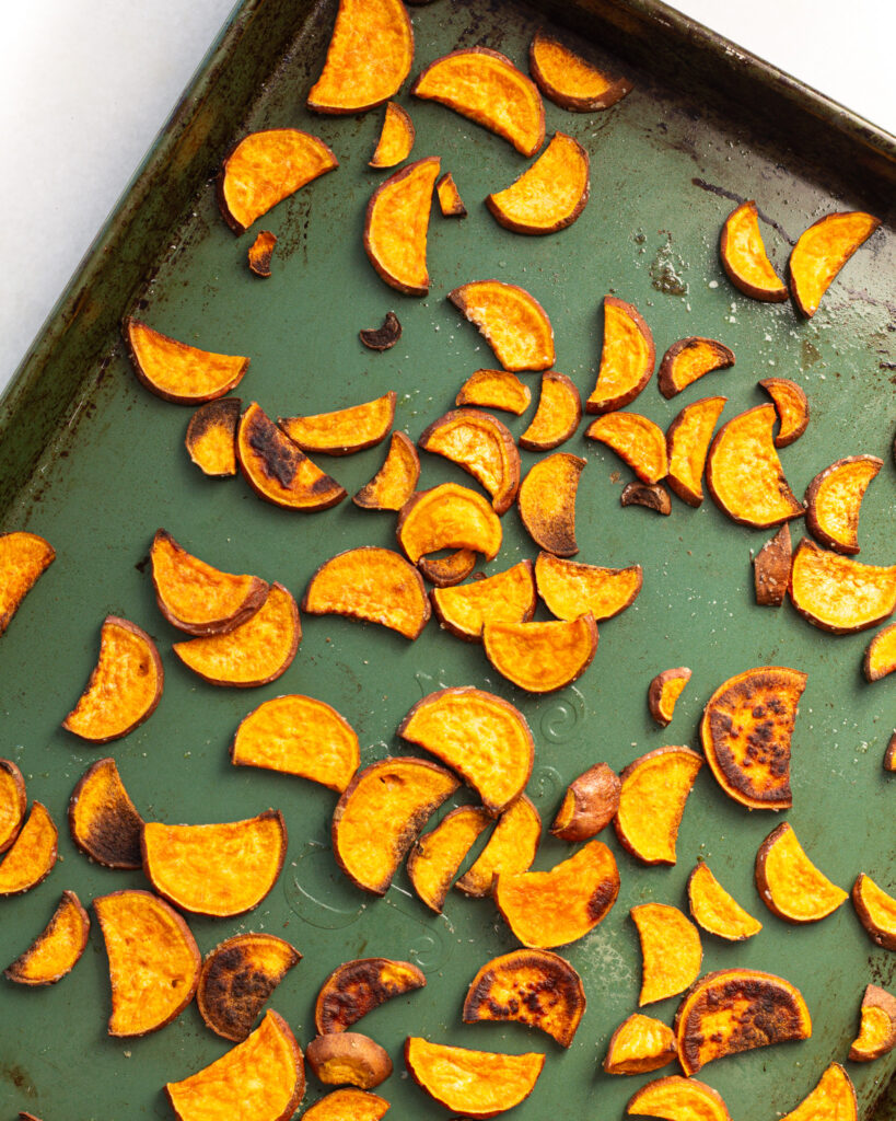 Baked sweet potato on baking sheet