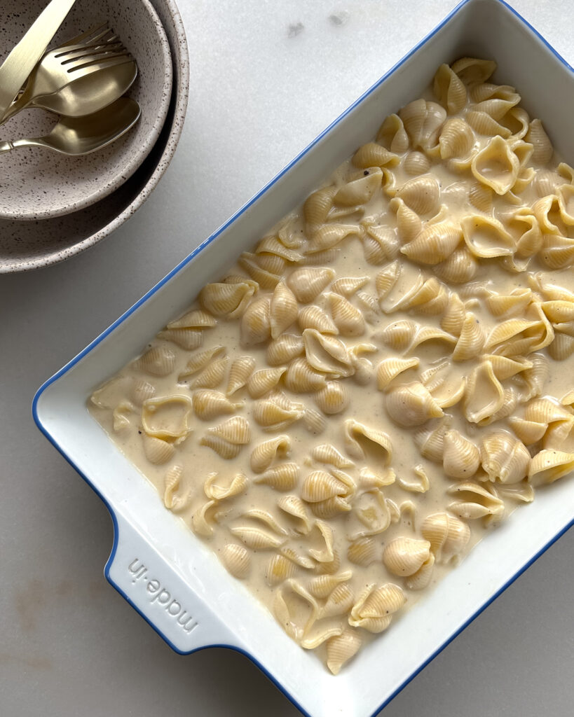 pasta and cheese sauce in baking dish