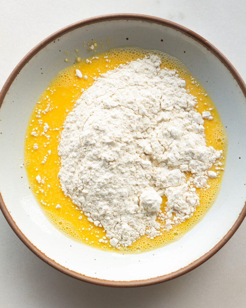 flour added to egg