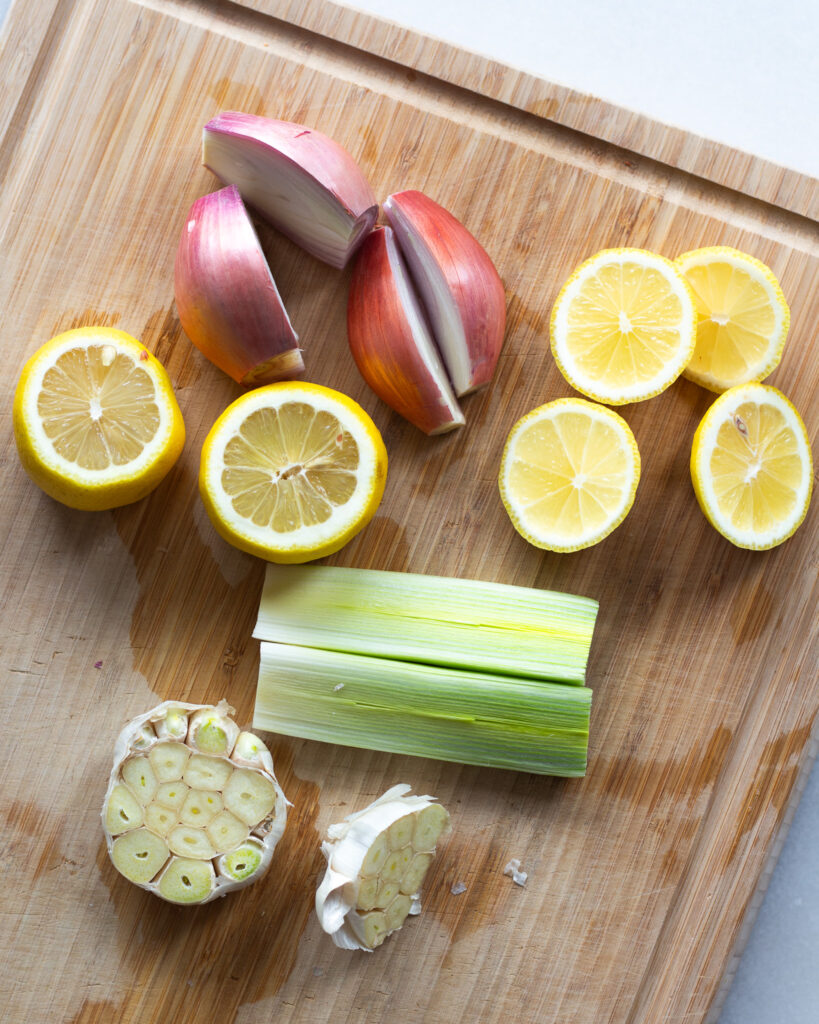 sliced shallot, lemons, leeks, and garlic