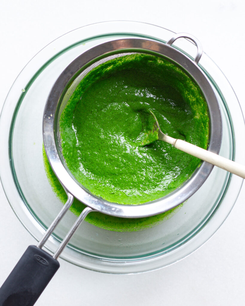 ramp oil being strained through a sieve, nearly done with the process