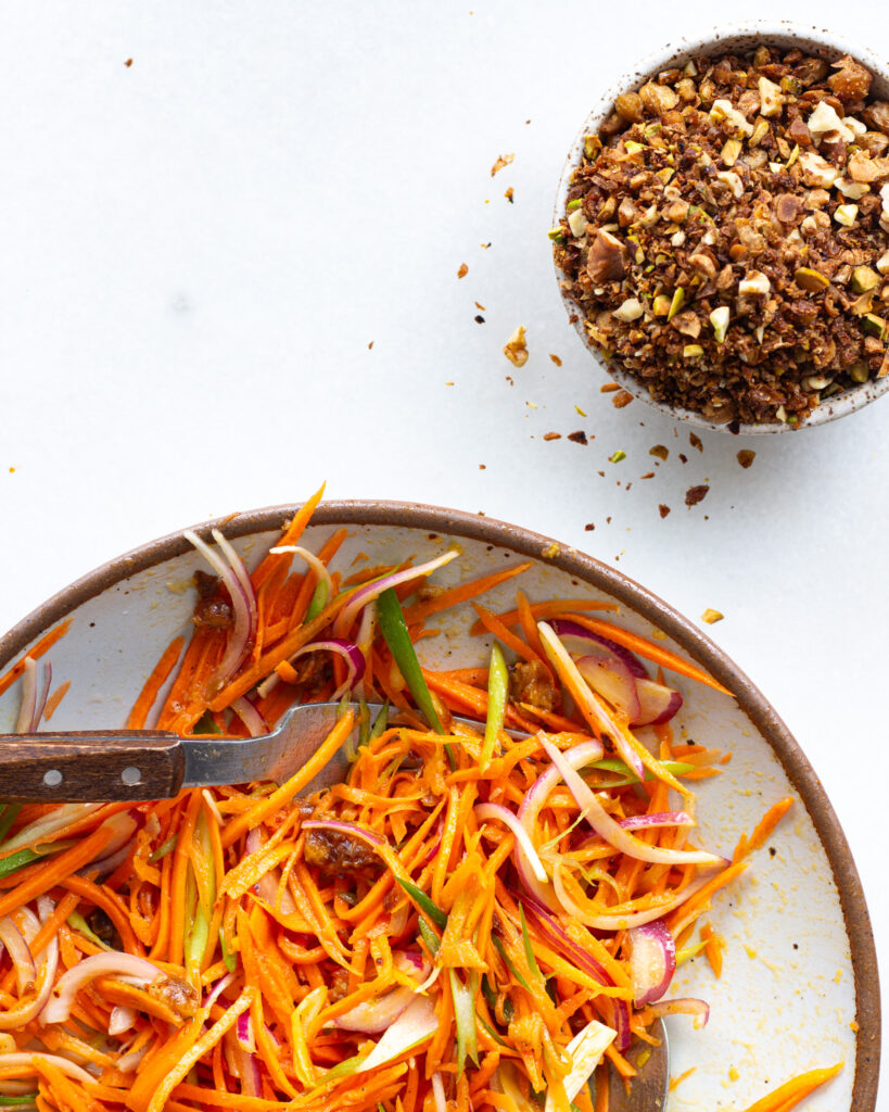 carrot salad and then a small bowl of the spicy chickpea mixture on one side
