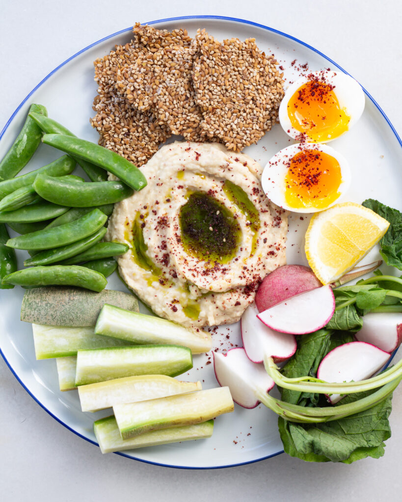 Lemon coriander white bean dip on a snack plate. 