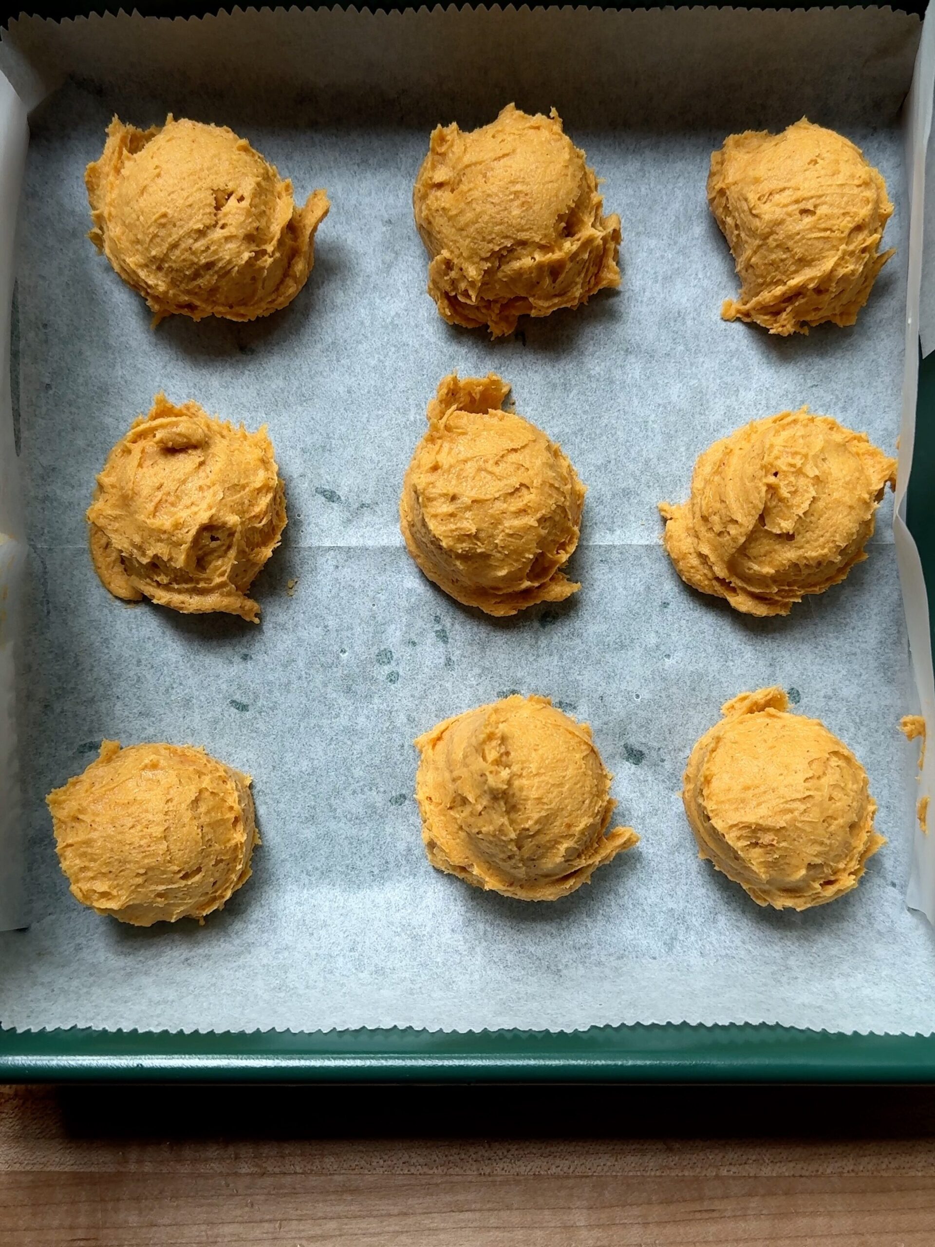 Scoops of dough for the pumpkin bars
