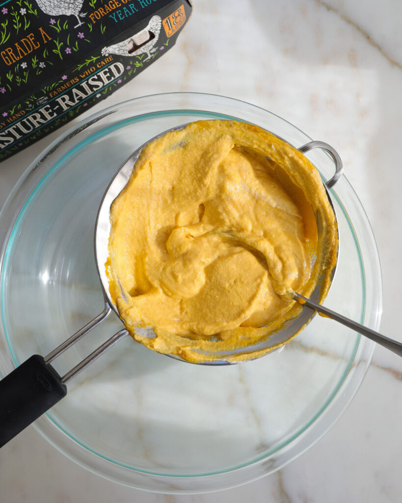 Pumpkin and ricotta draining before the mixture goes into spinach gnudi