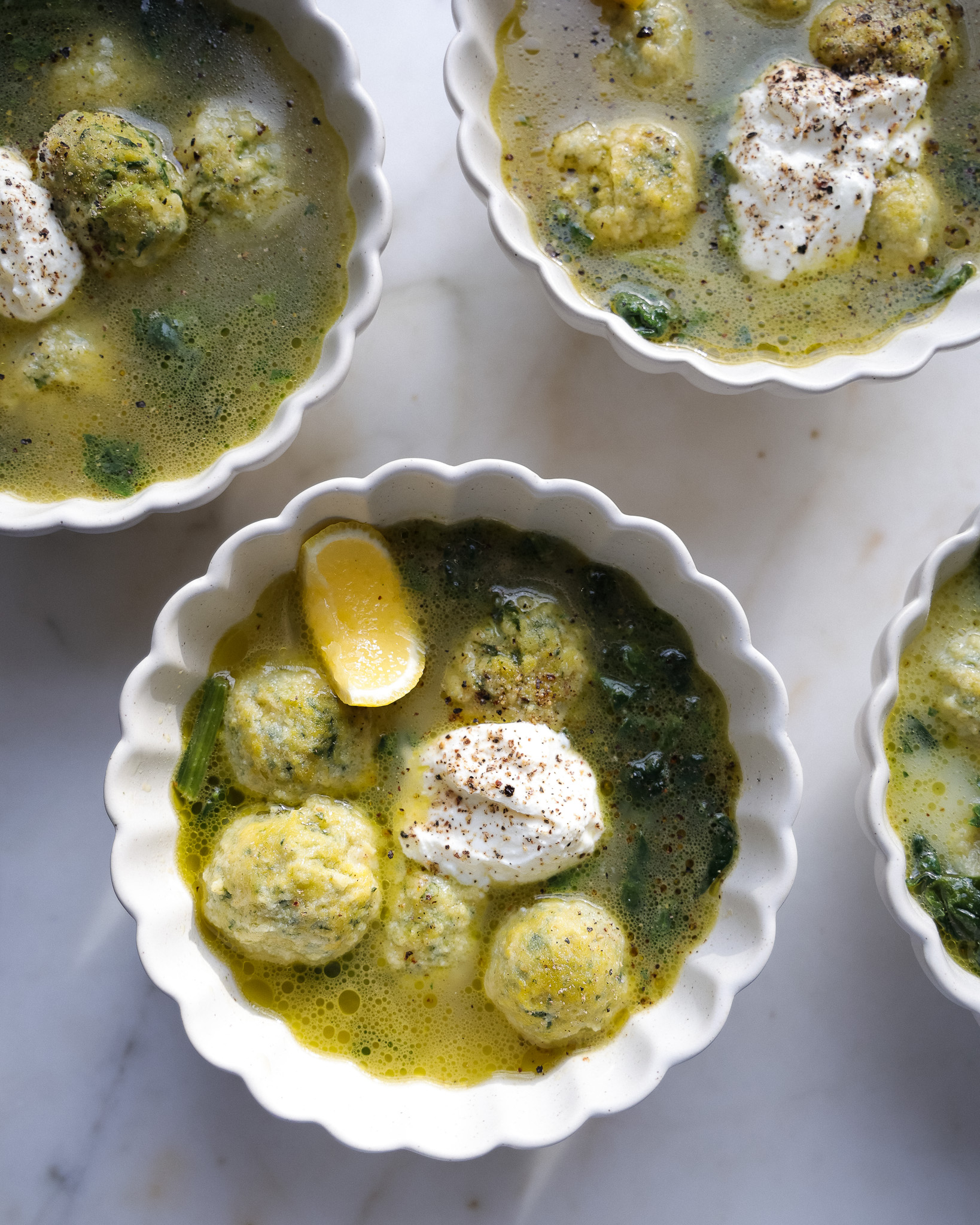 Spinach Gnudi in Parmesan Broth