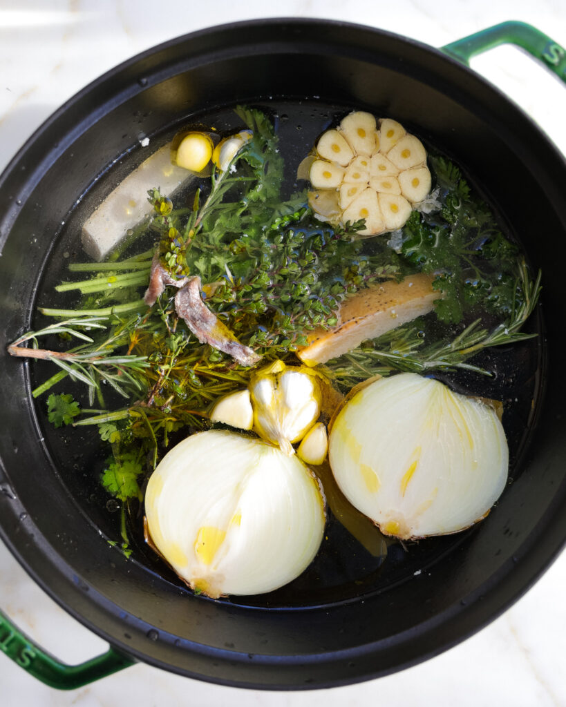 Showing the ingredients for parmesan broth