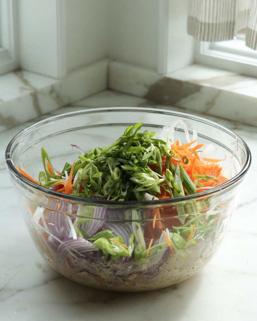 daikon radish slaw ingredients in a bowl.
