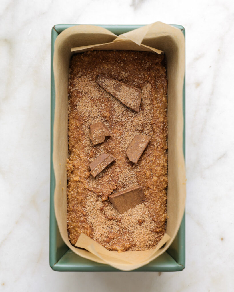 chocolate churro batter in a loaf pan