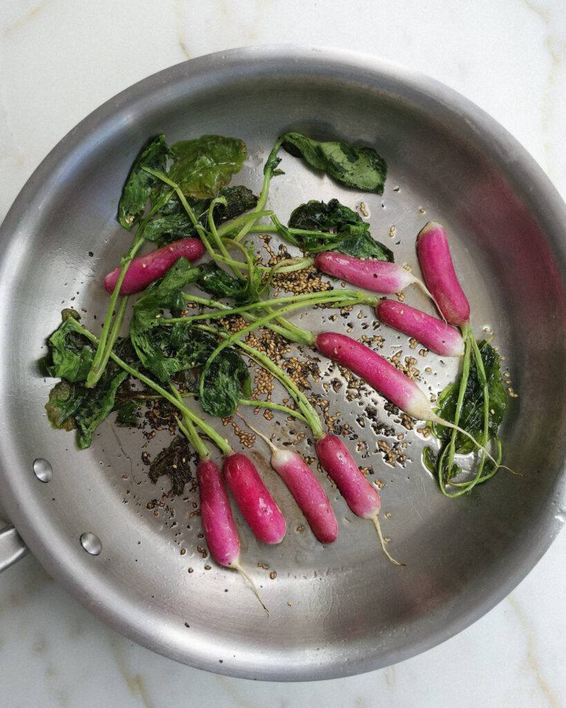 breakfast radishes being seared on a pan.
