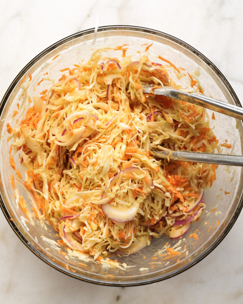 Cabbage and carrot slaw tossed with peanut ginger dressing.