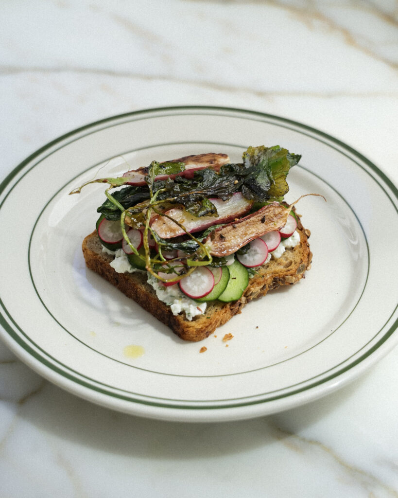 pan seared radishes and greens added to the sandwich.