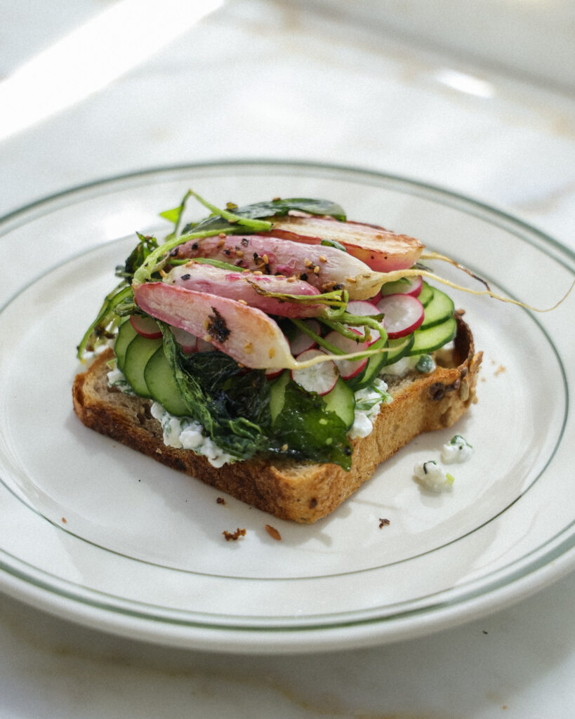 pan seared radishes and greens added to the sandwich.