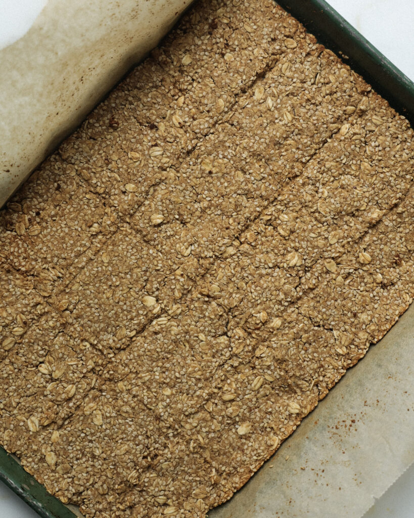 granola bars in a baking sheet.