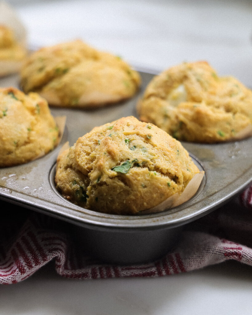 baked jumbo muffins in a muffin tin.