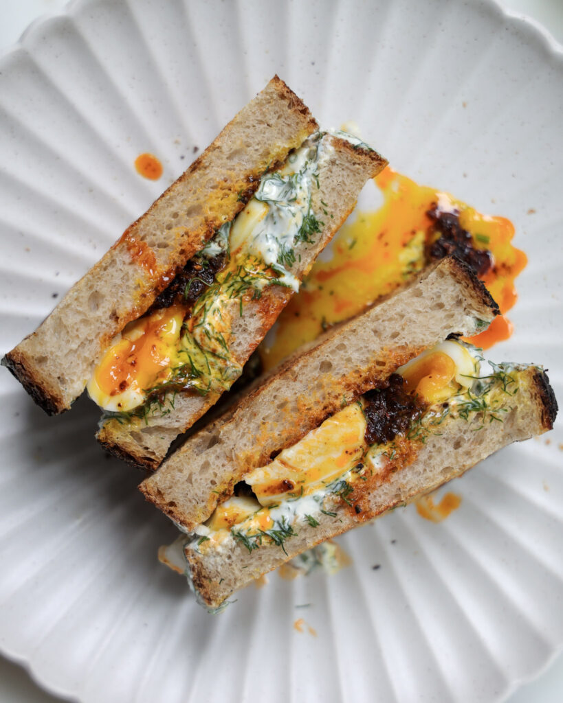 Çilbir sandwich halved.