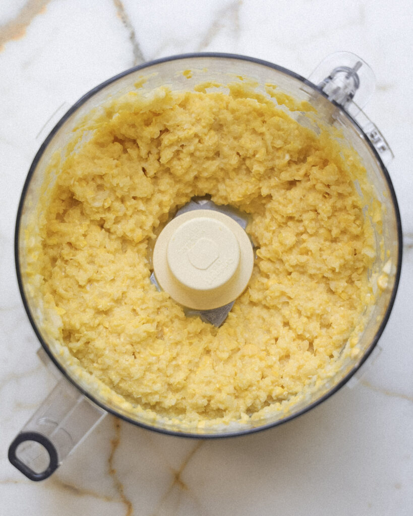 corn kernels, scallions, onions and miso paste in a food processor.