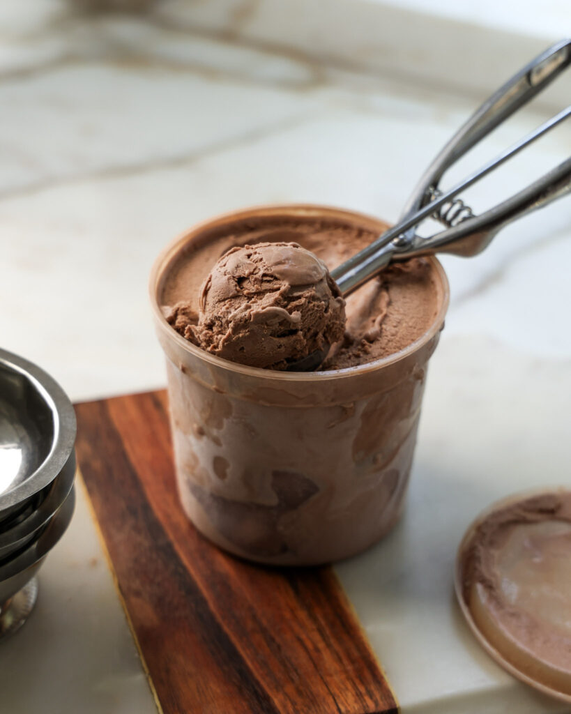 Chocolate ice cream being scooped