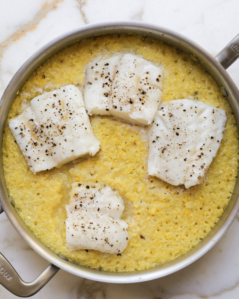 Cod filets placed over miso corn rice