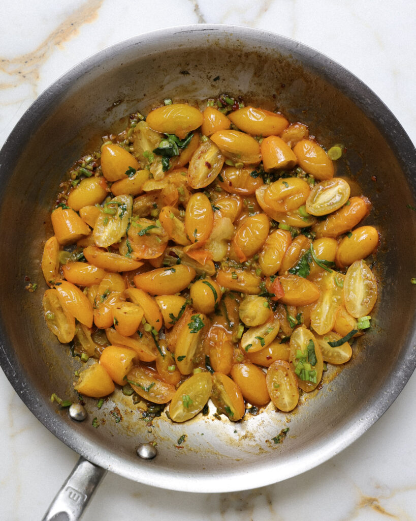 sungold tomatoes in a pan.