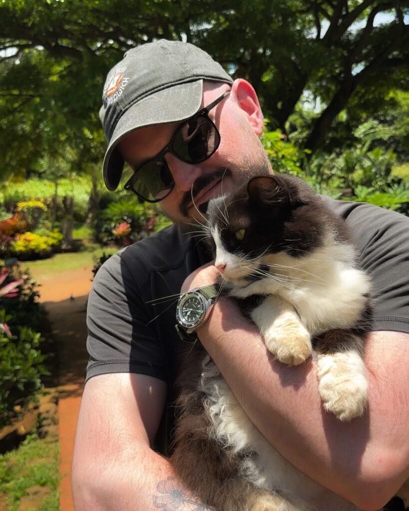 Holding a cat at Leilani Farm Sanctuary