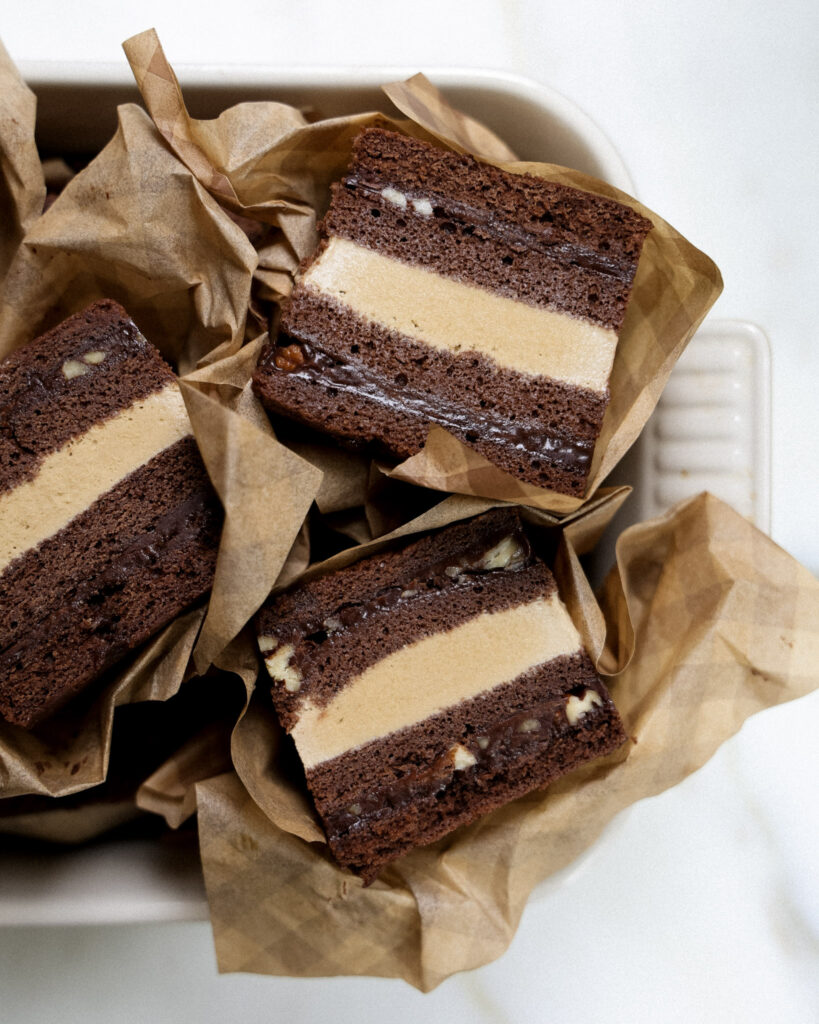 texas sheet cake ice cream sandwiches wrapped in parchment.