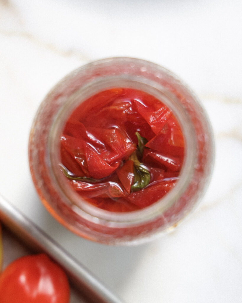 Pickled tomato skins in a jar.