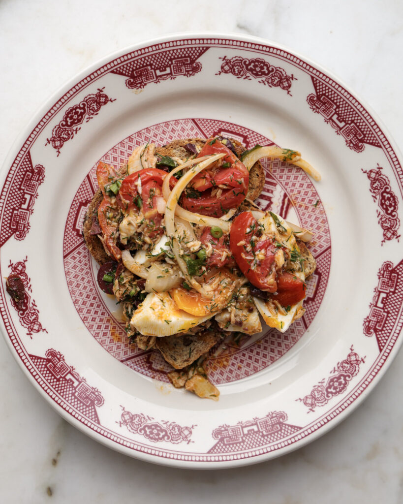 Summer tomato tuna salad on a plate.